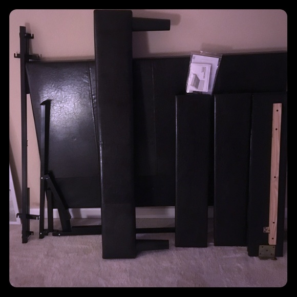 A Black Full Size Bed Frame.