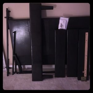 A Black Full Size Bed Frame.