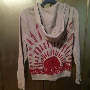 Free People sweatshirt with sun detail on back