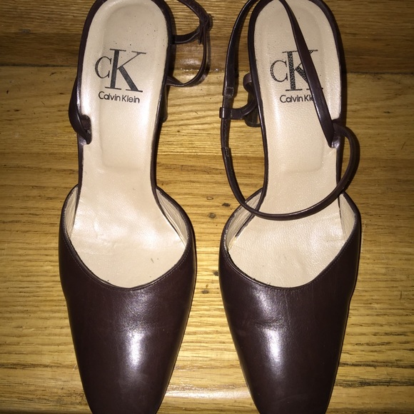Brown leather pumps