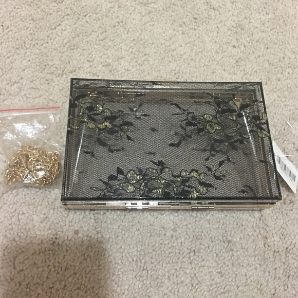 Hard shell lace black clutch