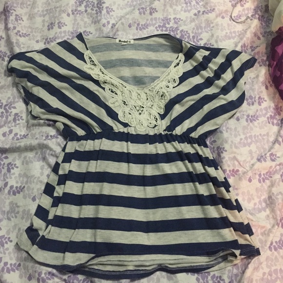 Blue and gray striped blouse.