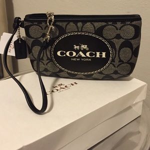 COACH Horse & Carriage signature medium wristlet