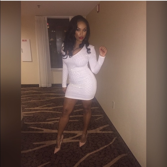 White beaded dress , quilted material..deep V-cut