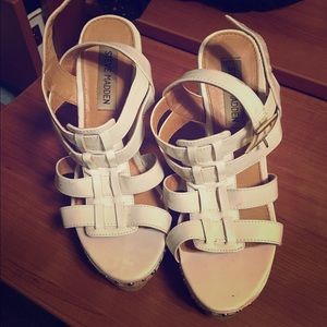 Lightly used Steve Madden white wedges!