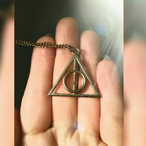 Harry Potter/Deathly Hallows necklace.