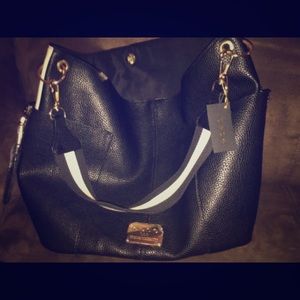 BEBE leather black and white purse brand new