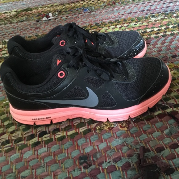 Slightly worn Nike Lunar athletic shoes