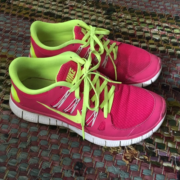 Neon pink & yellow Nike Free 5.0 running shoes