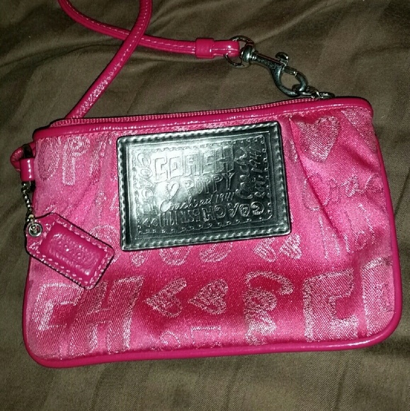 Authentic poppy coach wristlet **SOLD**