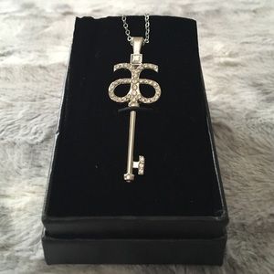 Silver Arbonne key necklace