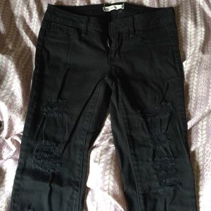 Black bullhead distressed skinny jeans