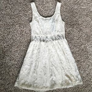 White/cream dress.