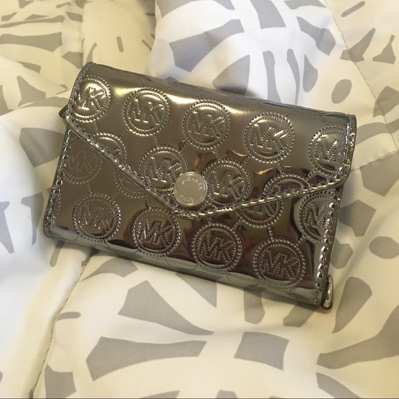 MK logo embossed wristlet with iPhone 5 case