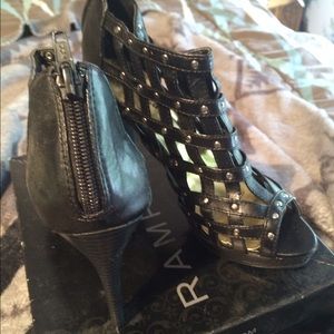 Black studded open toed shoes.  Worn once inside.