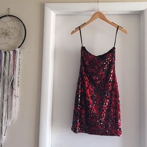 Strapless red sequin dress.