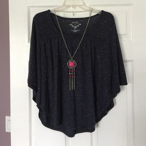 Dome-sleeved blue heather w/necklace. Size XL
