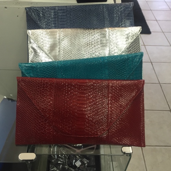 Red,turquoise,silver & light blue clutches