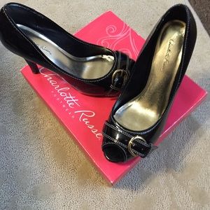 Black peep toe patent leather heels