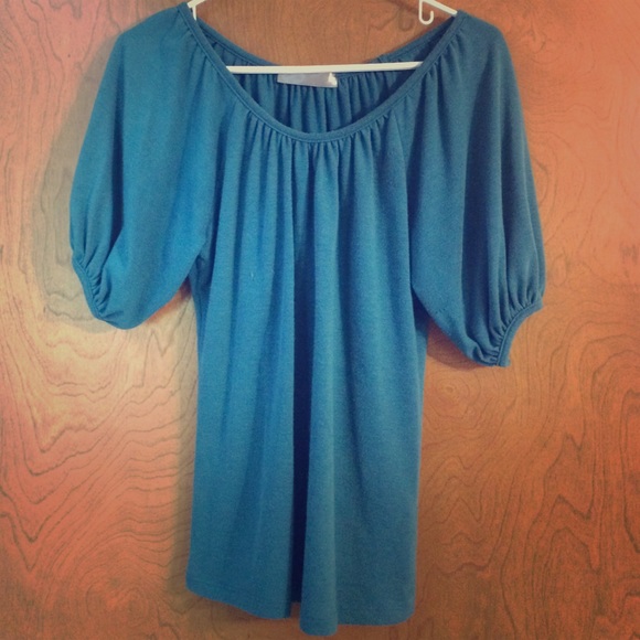 Blue fitted top with puffy sleeves