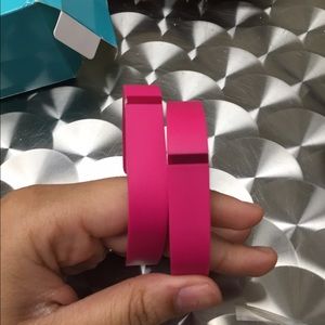 Fit bit . ONE BAND IS LARGE THE OTHER IS SMALL .