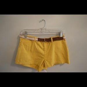 Cute yellow shorts with a brown belt