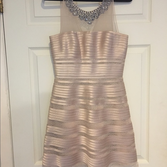 Champagne-colored formal dress.