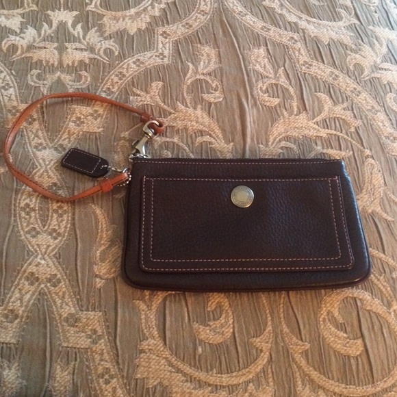 Brown leather coach wristlet
