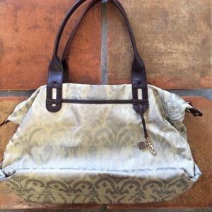 Stella and dot how does she do it tote