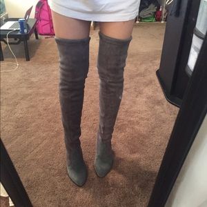Sueded knee high boots.