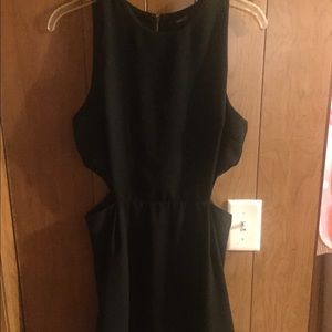 Woman's black dress with openings on both sides