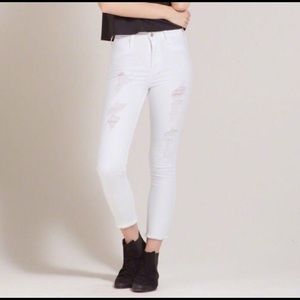 White & black Hollister ripped jeans