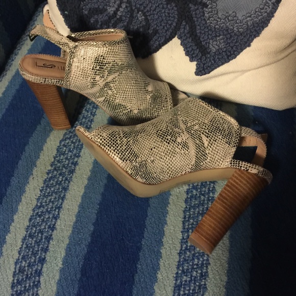 Snake skin open toe booties. Only worn twice!