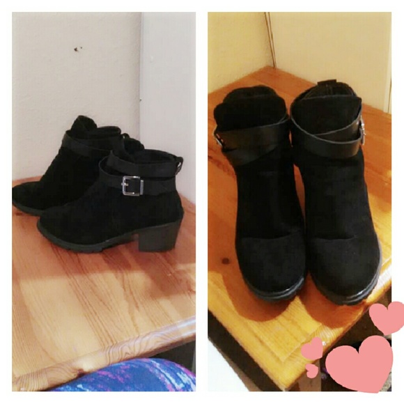 Black booties with gold buckle.