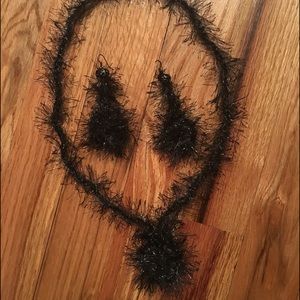 One of a kind crochet necklace and earrings set.