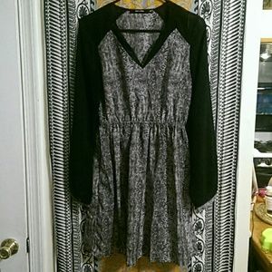 Long sleeve cocktail dress with sheer sleeves