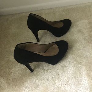 Black suede pumps
