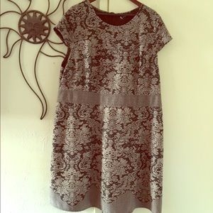 Career dress with luxurious fabric and pattern