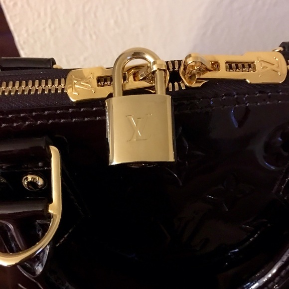 Louis Vuitton Alpha PM Amarante Satchel