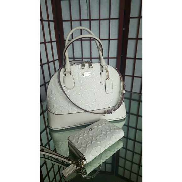 Cora Debbossed Patent Leather dome.
