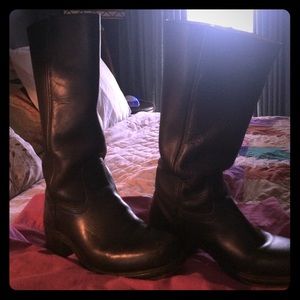 Black, leather Frye boots.