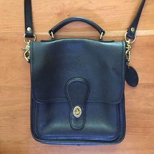 Coach look alike black leather messenger bag.