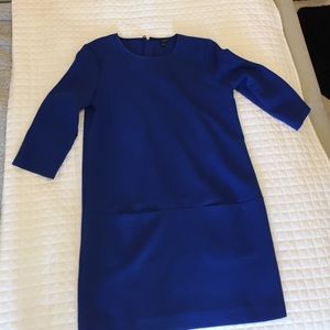 Size 8. Blue mini dress with pockets