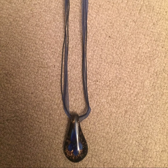 Very cute glass necklace.