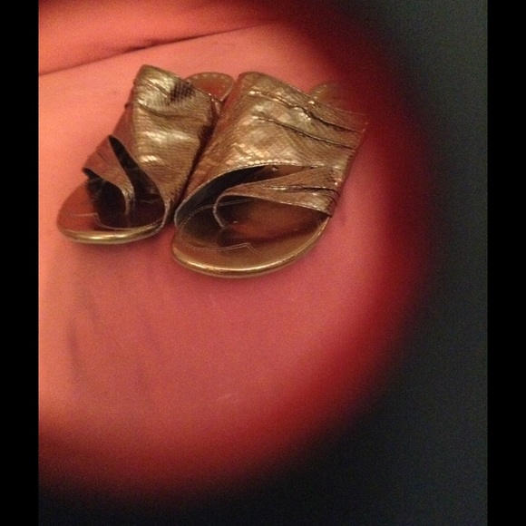 Gold sandles- between toe-   very pretty shoes.