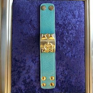 Light blue Studded cuff with gold details