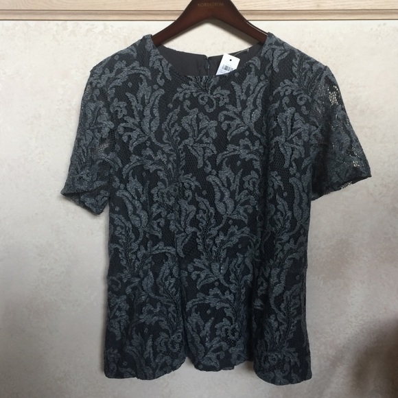 Short sleeve peplum top with lace overlay