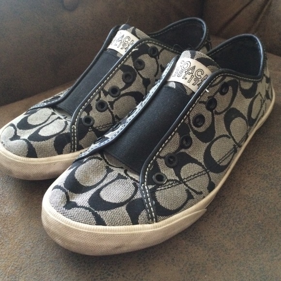 Black coach slip-ons