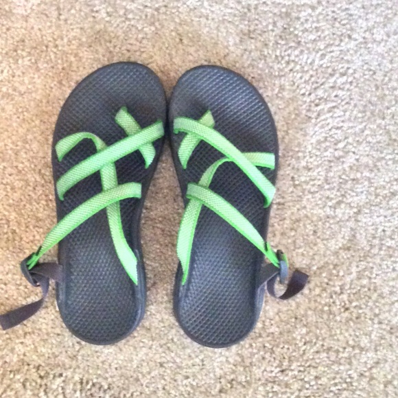 Green and white Chaco slip -ons