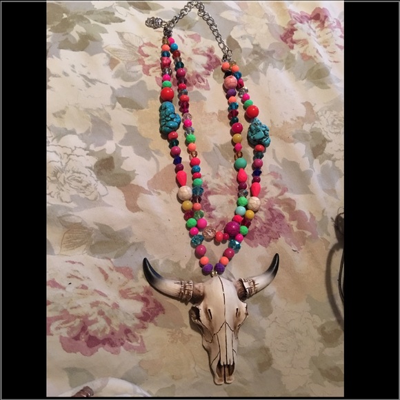 Long horn multi color beaded necklace .